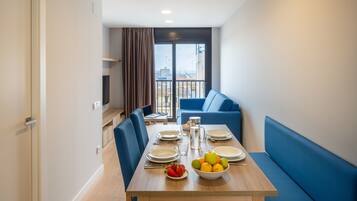 Premium Apartment | Living area | Flat-screen TV