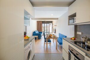 Club Apartment | Living area | Flat-screen TV