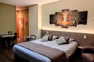 Superior Room | Hypo-allergenic bedding, pillowtop beds, in-room safe, desk