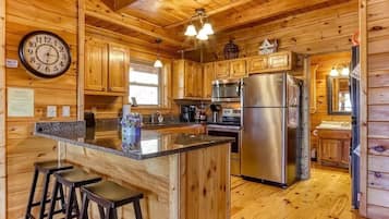 Microwave, oven, dishwasher, dining tables