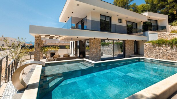 A modern two-story house with a swimming pool, stone pillars, and a view of the sea. - Lovely home in Slivno with WiFi (Slivno)