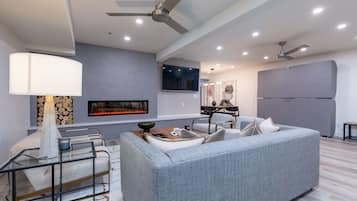 Smart TV, fireplace, books