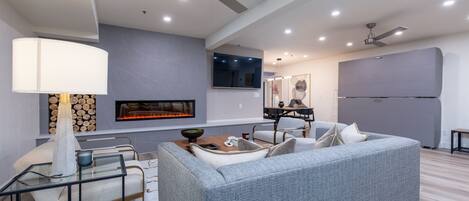 Smart TV, fireplace, books