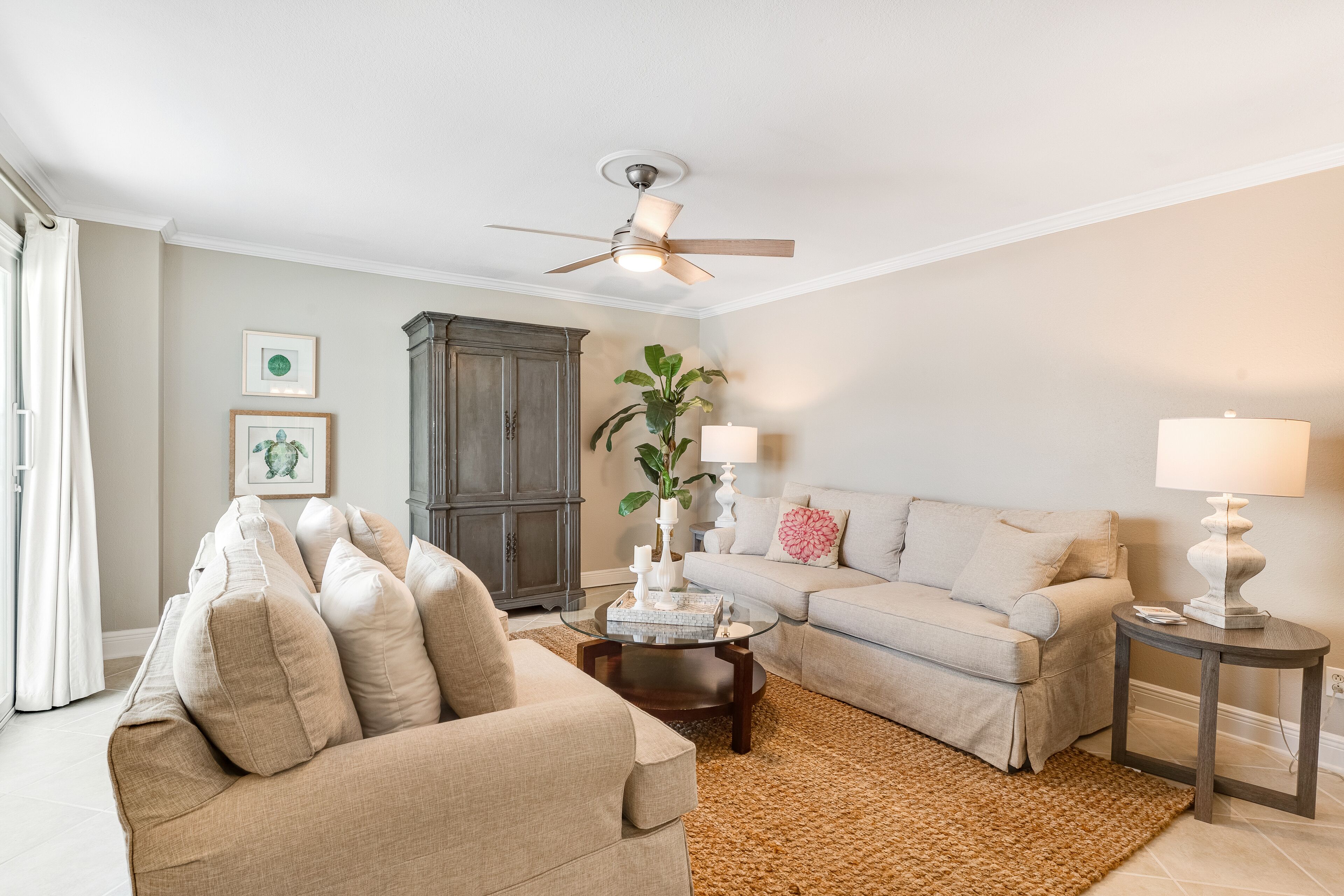 Bright & beachy getaway with beach access, shared pool, furnished deck, & WiFi