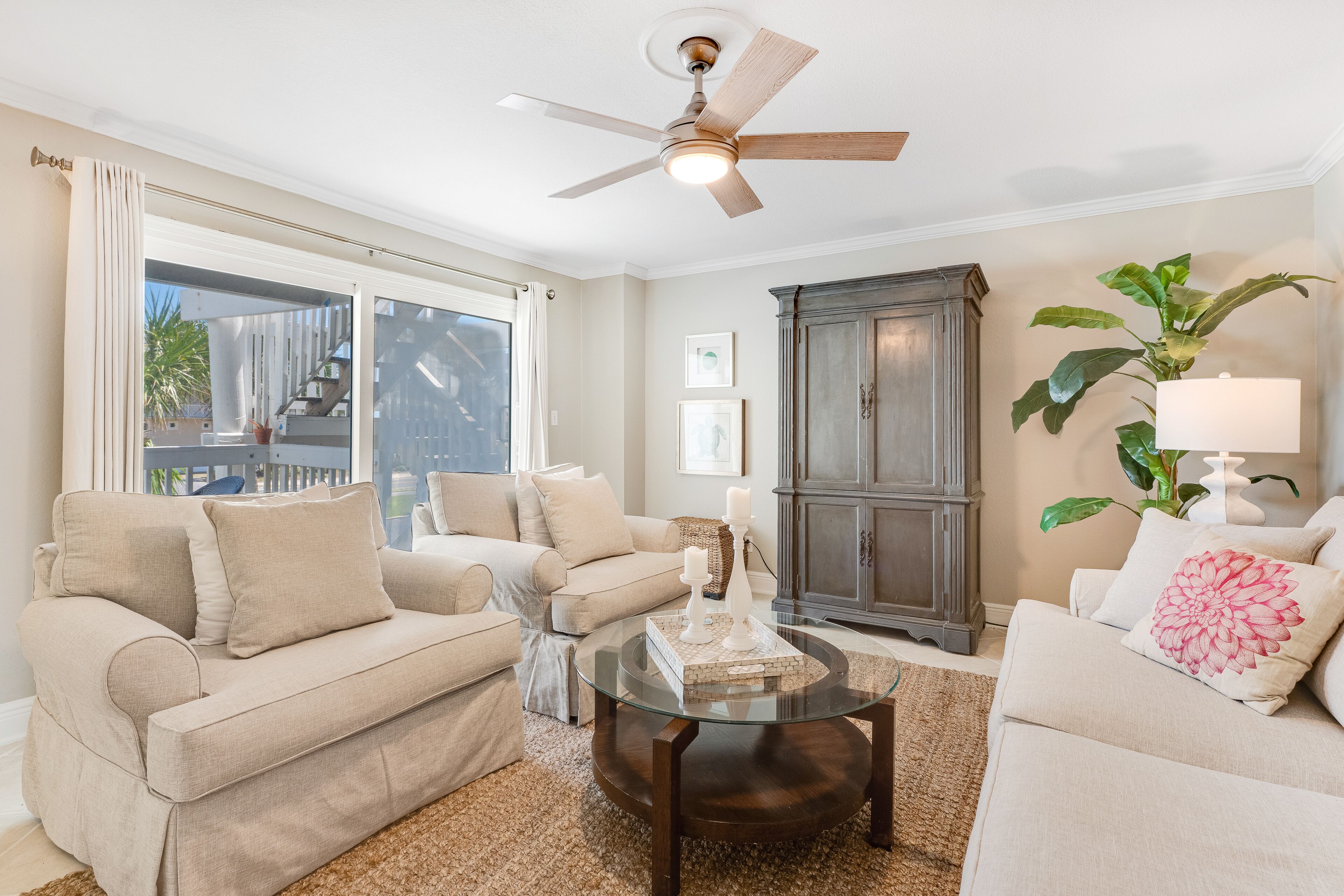 Bright & beachy getaway with beach access, shared pool, furnished deck, & WiFi