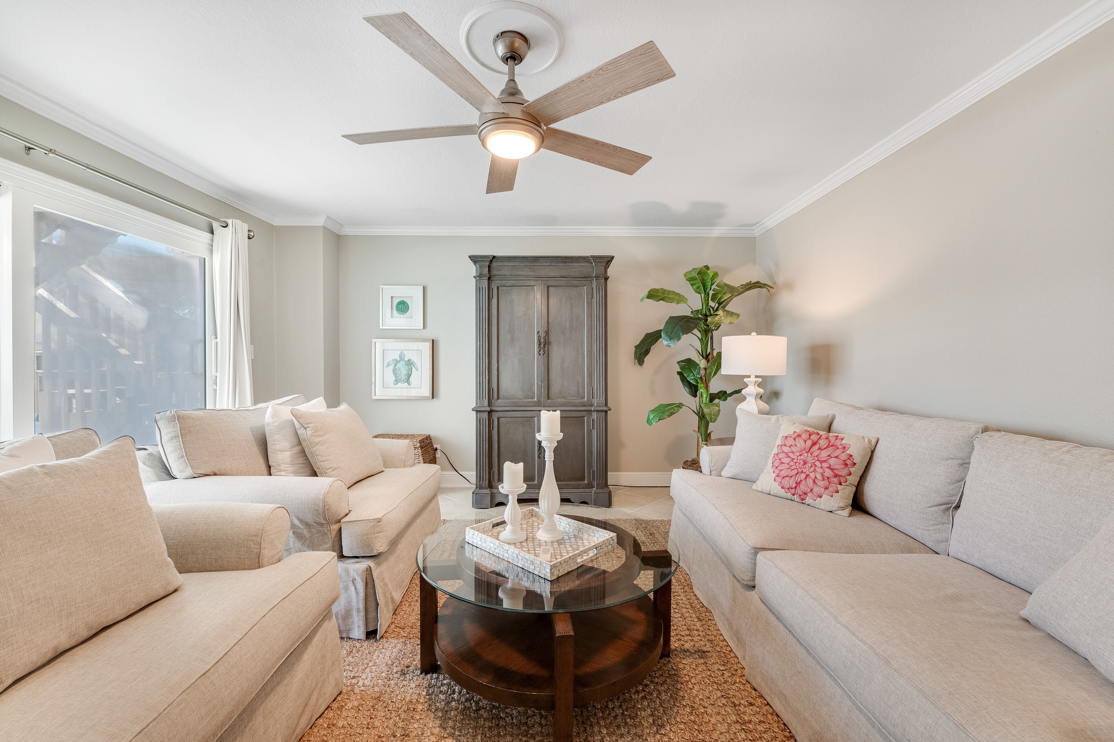 Bright & beachy getaway with beach access, shared pool, furnished deck, & WiFi