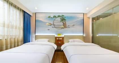 Zhenghao Business Hotel (Qingxin Sports Center)