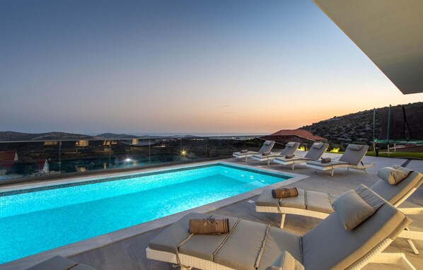 Outdoor pool, sun loungers