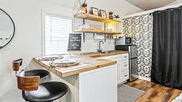 Fridge, microwave, coffee/tea maker, toaster