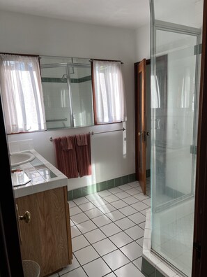 Shower, hair dryer, towels, soap
