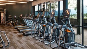 A gym with multiple treadmills, exercise bikes, and a variety of other fitness equipment. - SPRING BREAK - SLOPESIDE Luxury Ski-in/Ski-out- Grand Colorado Peak 8 - SLEEPS 4 (Breckenridge)