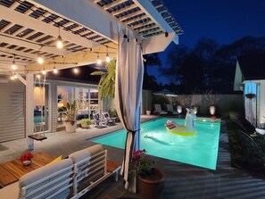 Outdoor pool, a heated pool - Charming Bungalow with pool/jacuzzi/game room. (Houston)