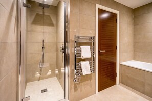 Bathtub, hair dryer, towels