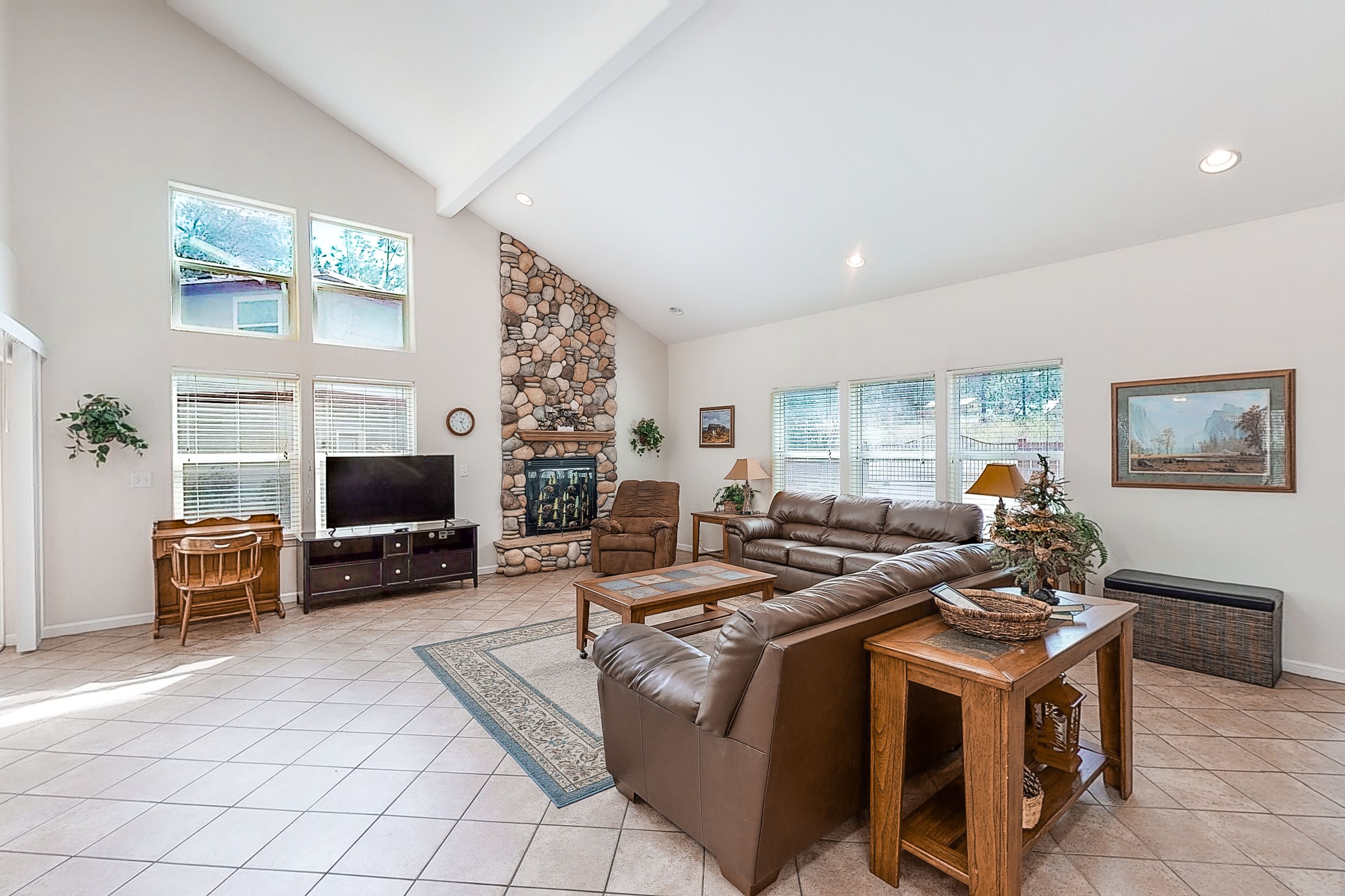 Home with 2 fireplaces, game room & shared pool/hot tub - walk to Bass Lake