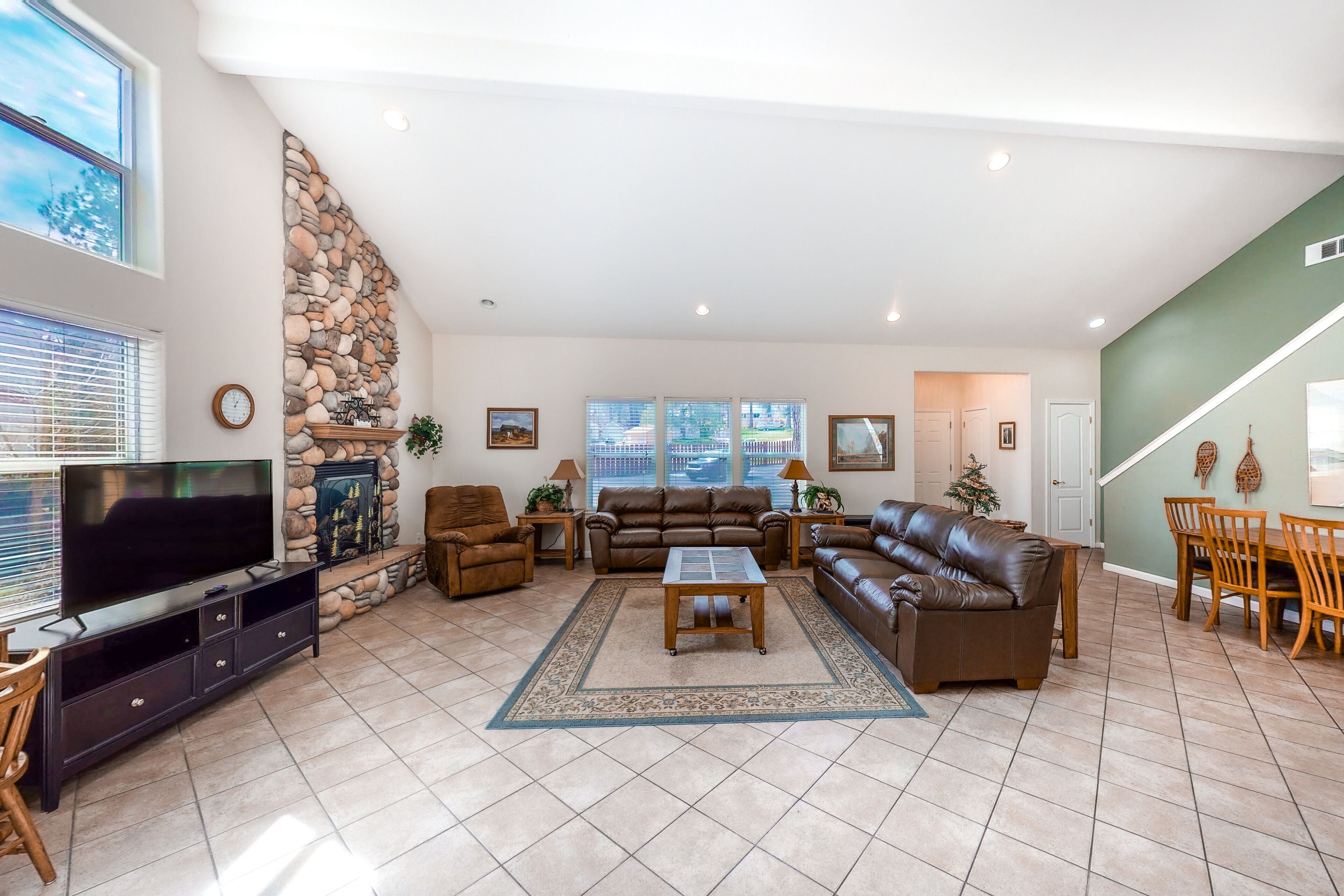 Home with 2 fireplaces, game room & shared pool/hot tub - walk to Bass Lake