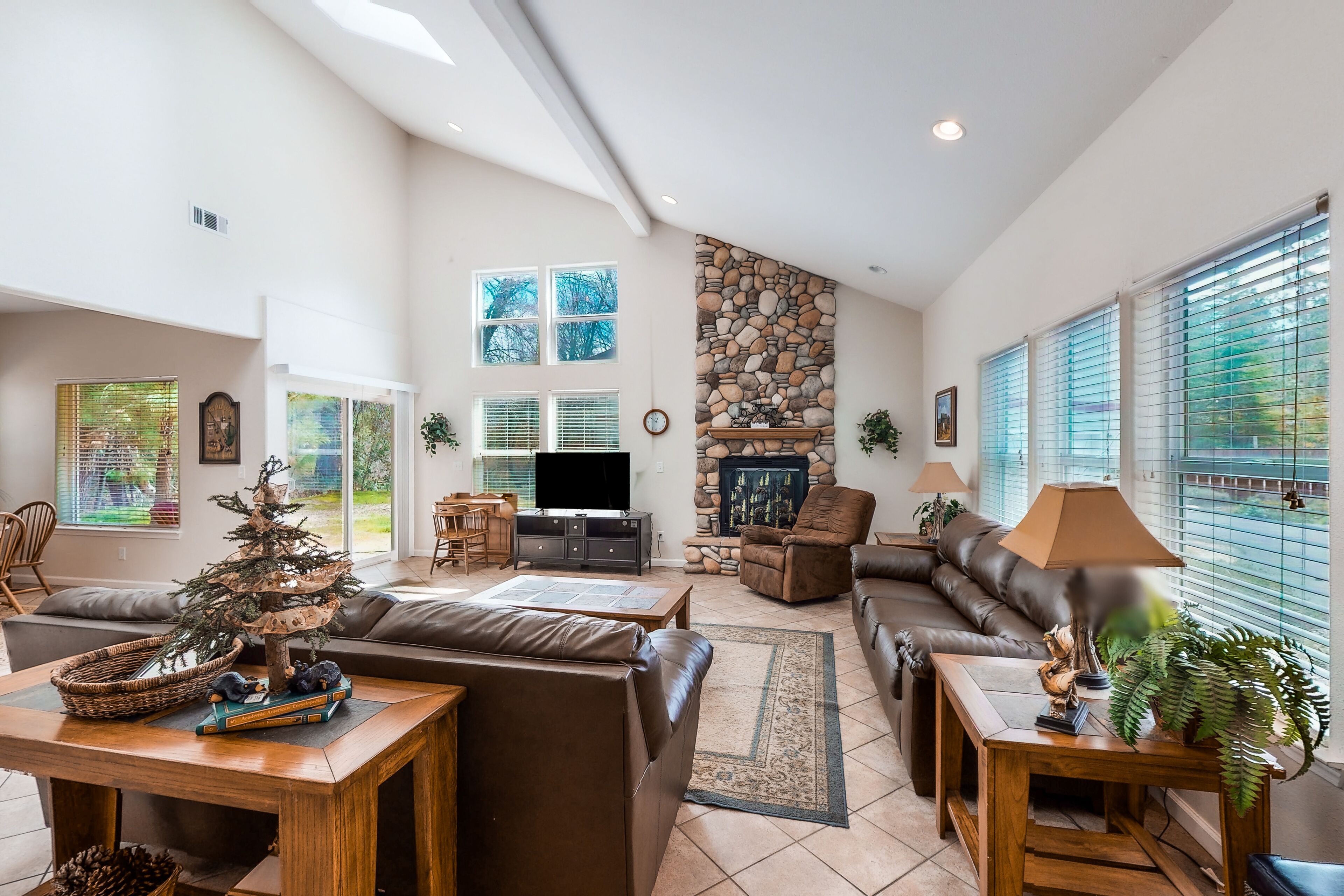 Home with 2 fireplaces, game room & shared pool/hot tub - walk to Bass Lake