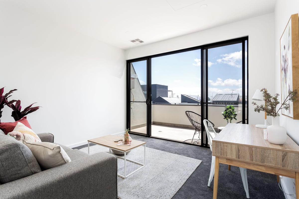 Two Bed Two Bath Apartment With Parking | Living area | Flat-screen TV