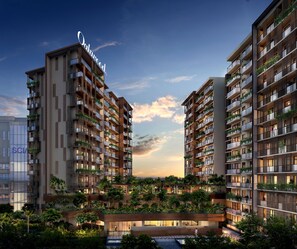 A modern high-rise building with multiple balconies, a rooftop garden, and a visible name sign. - Oakwood Premier Phnom Penh (Phnom Penh)