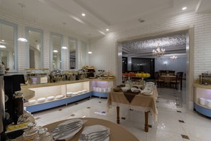 Daily buffet breakfast (USD 14 per person)