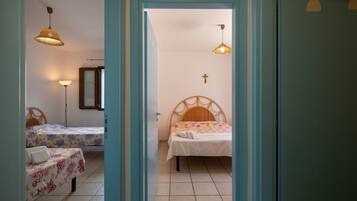 2 habitaciones y ropa de cama