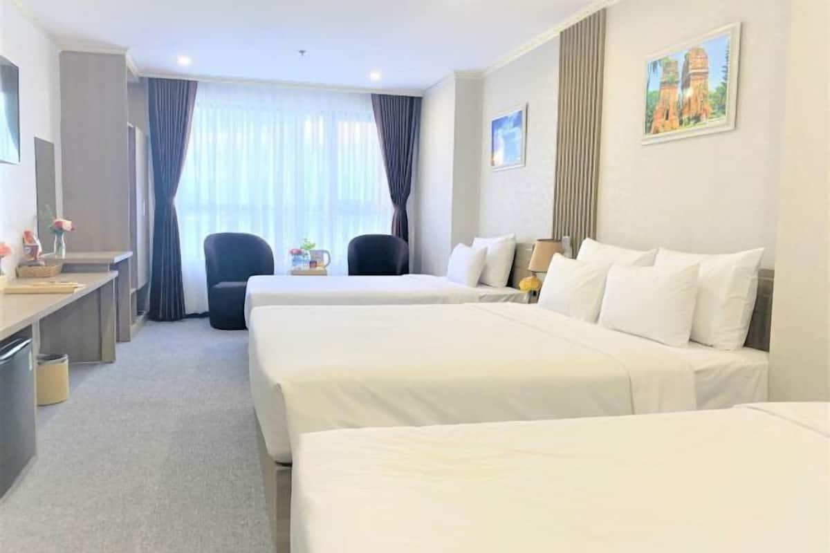 Premium bedding, desk, laptop workspace, free WiFi