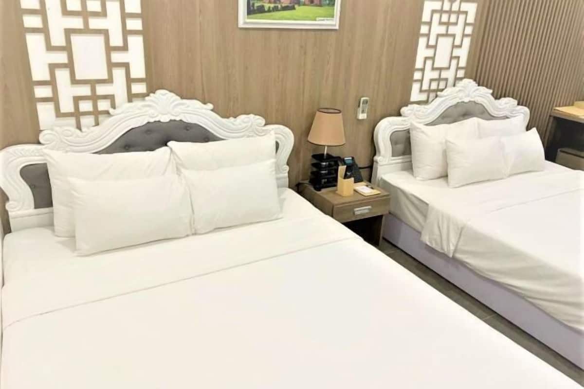 Premium bedding, desk, laptop workspace, free WiFi