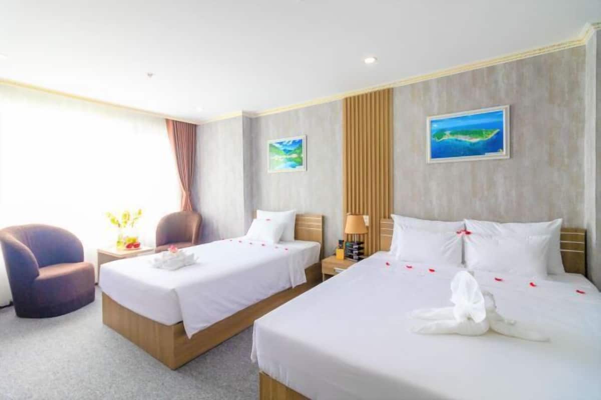 Premium bedding, desk, laptop workspace, free WiFi
