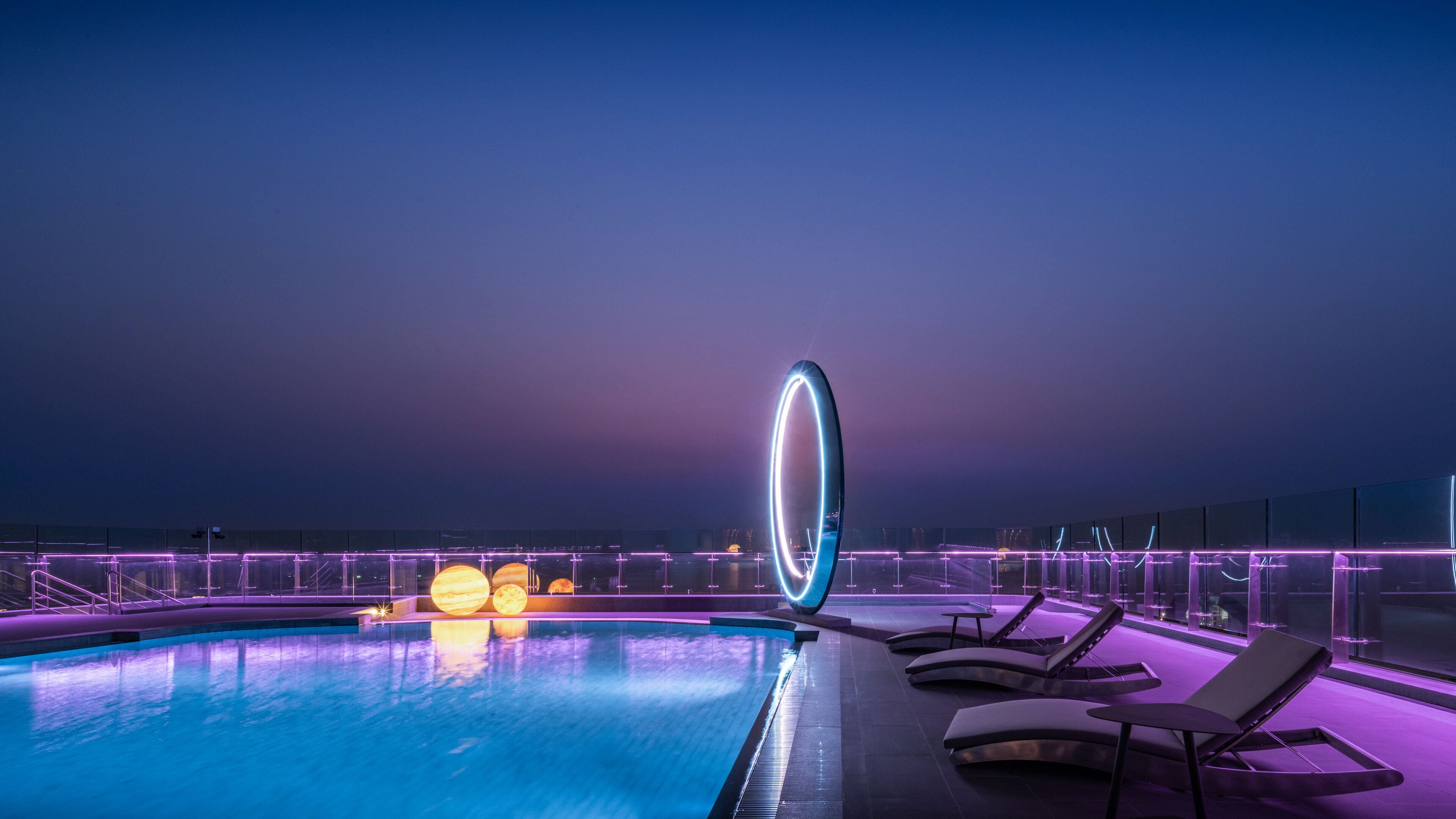 outdoor pool, open 6:00 am to 8:00 pm, pool umbrellas, pool loungers