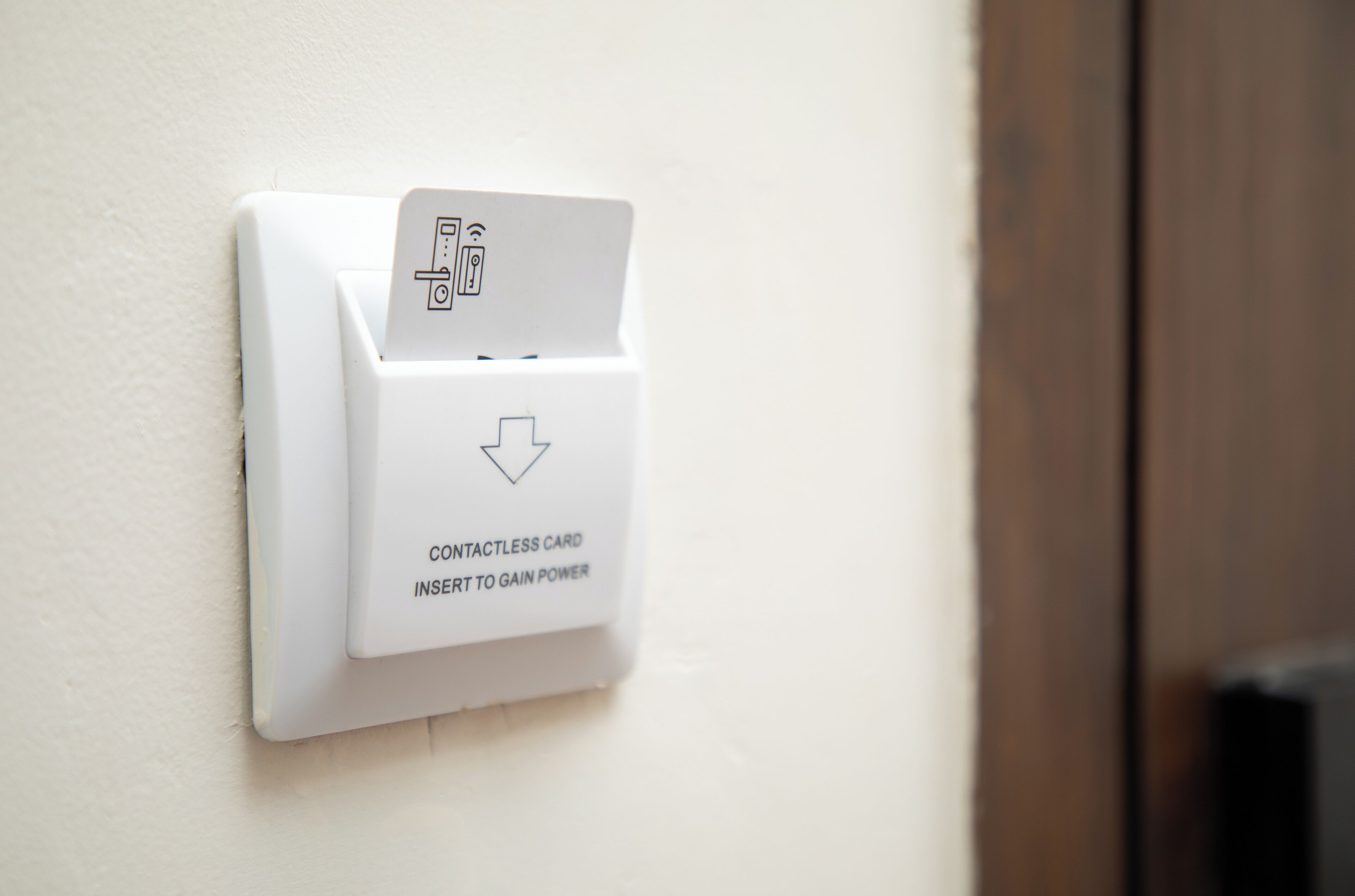 A contactless card reader on a wall.