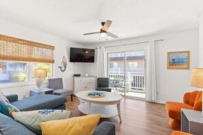 TV, books - Filling Beachy by Brunswick Vacation Rentals: Oceanfront Complex with Pool (Ocean Isle Beach)