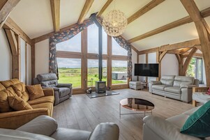 Casa de campo | Zona de estar | Una chimenea