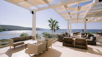 Breakfast, lunch, dinner served; beach views