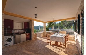 Enjoy al fresco dining with a fully equipped kitchen and scenic views.