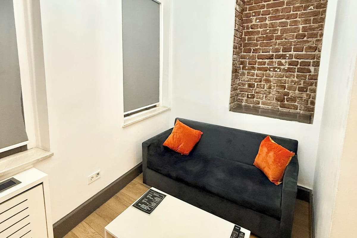 Economy Apartment | 1 bedroom, in-room safe, blackout curtains, iron/ironing board