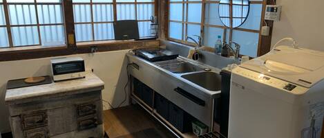 Fridge, microwave, stovetop, cookware/dishes/utensils