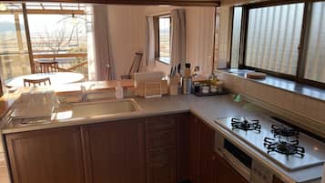 Fridge, microwave, stovetop, cookware/dishes/utensils