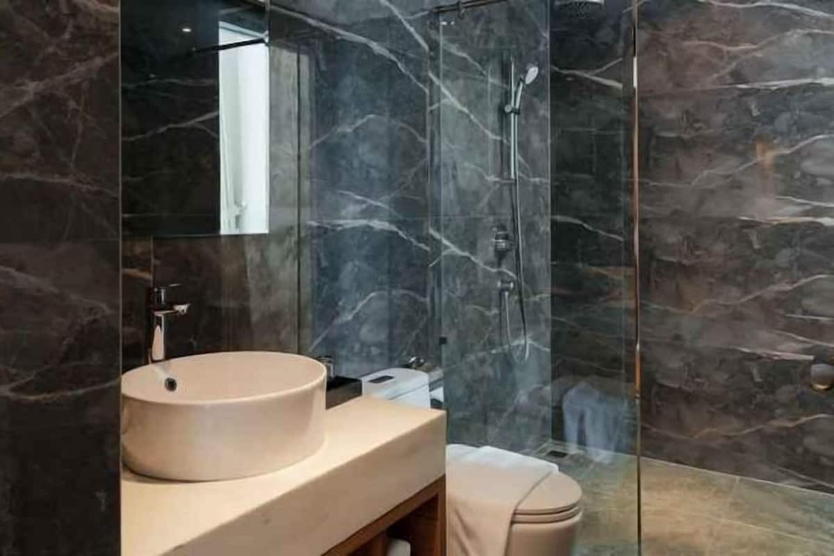 Bathroom | Shower, hair dryer, bathrobes, slippers