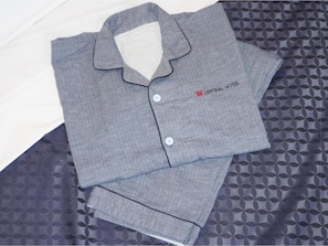 A neatly folded grey shirt with a collar and buttons, and a small logo on the left chest area. - Standard Room only Triple twin  extra bed no / Taito-ku Tokyo (Taito-ku)