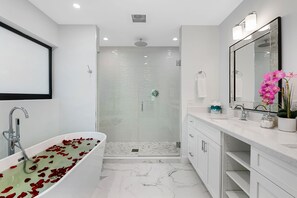 Bathtub, hair dryer, towels