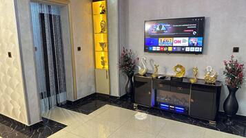 Luxe studio suite | Een kluis op de kamer, verduisterende gordijnen, geluiddichte muren