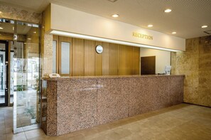 Welcome to the hotel reception area, where friendly staff are available to assist with your stay.