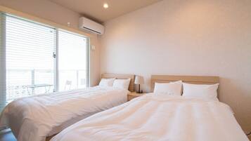 1 室のベッドルーム、デスク、WiFi (無料)、ベッドシーツ