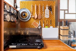Fridge, microwave, stovetop, cookware/dishes/utensils
