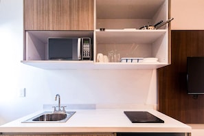 Fridge, microwave, stovetop, coffee/tea maker