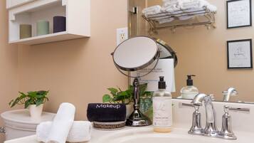 Combined shower/tub, hair dryer, towels, soap