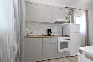 Køleskab, ovn, brødrister