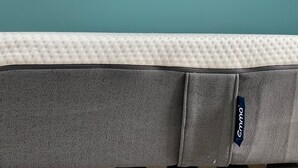 A close-up of a textured fabric with a visible brand tag. - BRAND NEW LUXURY HOUSE NEAR PORT IN PEACE (Le Palais)