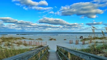 On the beach, sun loungers, beach towels