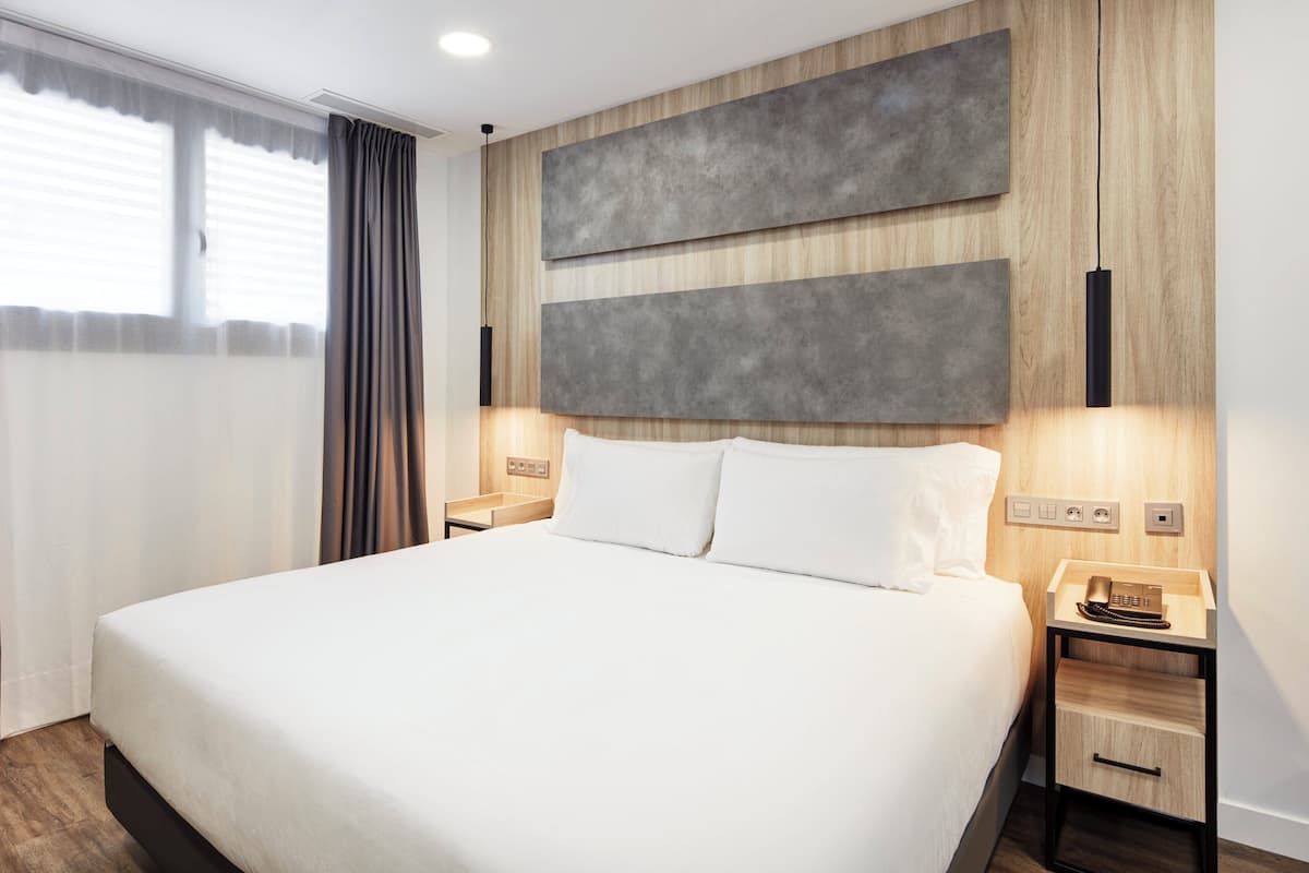 Superior-Zimmer | Daunenbettdecken, Minibar, Zimmersafe, kostenloses WLAN