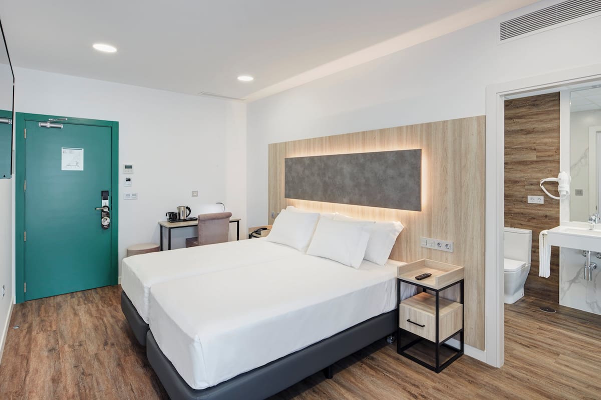 Daunenbettdecken, Minibar, Zimmersafe, kostenloses WLAN